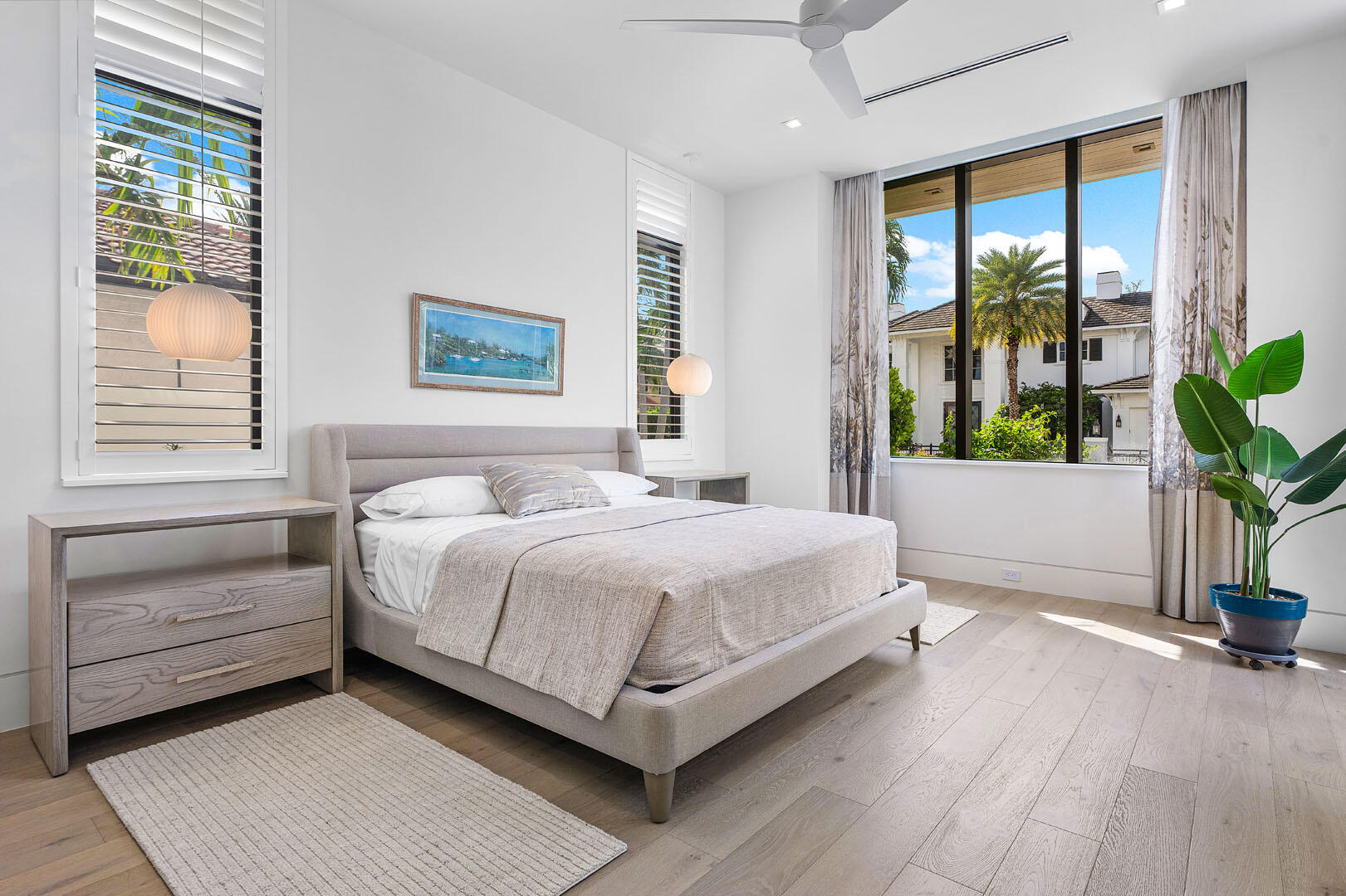 175 Alexander Palm Road Boca Raton, FL 33432 - Photo 29 of 71 a spacious bedroom with a bed and a window