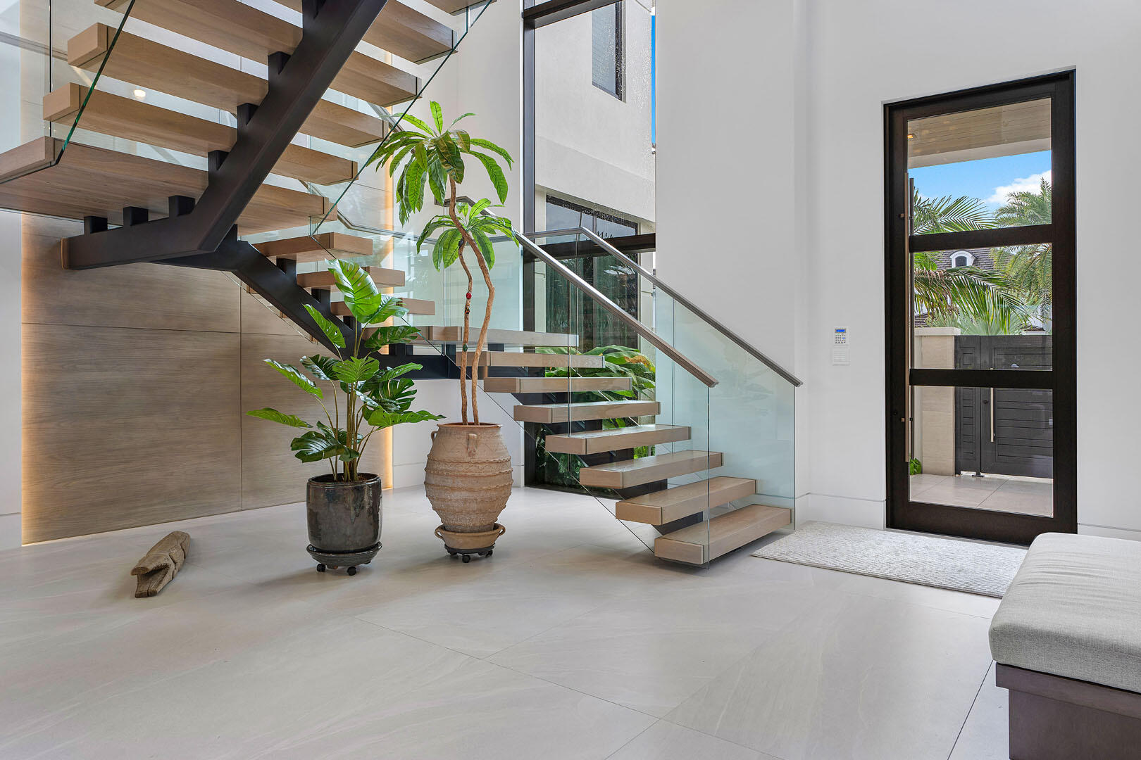 175 Alexander Palm Road Boca Raton, FL 33432 - Photo 33 of 71 a view of entryway with a front door