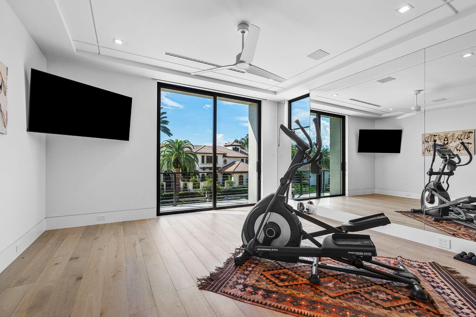 175 Alexander Palm Road Boca Raton, FL 33432 - Photo 37 of 71 a view of a room with gym equipment