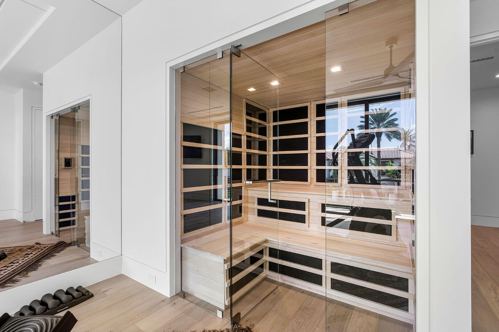 175 Alexander Palm Road Boca Raton, FL 33432 - Photo 38 of 71 a view of an empty room with wooden floor and windows