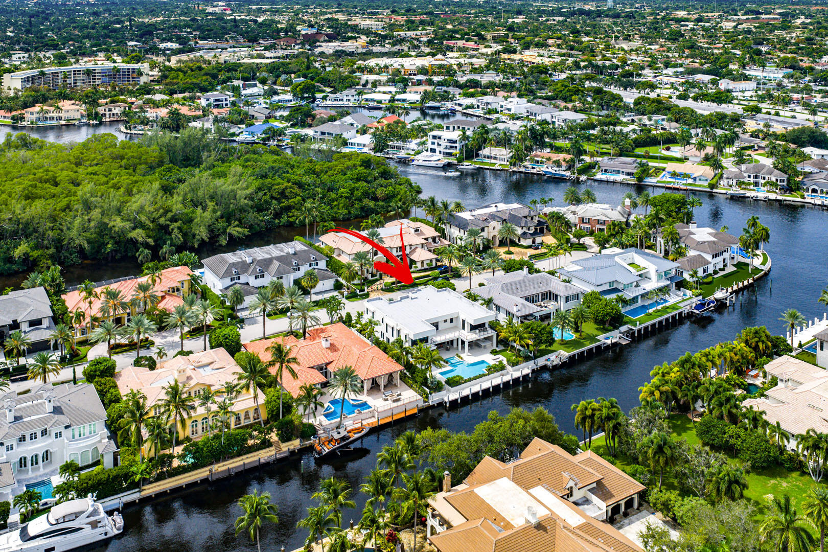175 Alexander Palm Road Boca Raton, FL 33432 - Photo 70 of 71 an aerial view of lake and residential houses with outdoor space