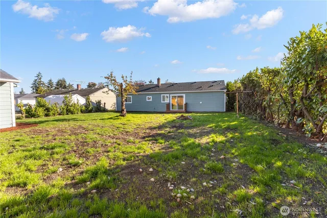 a view of a house with a big yard