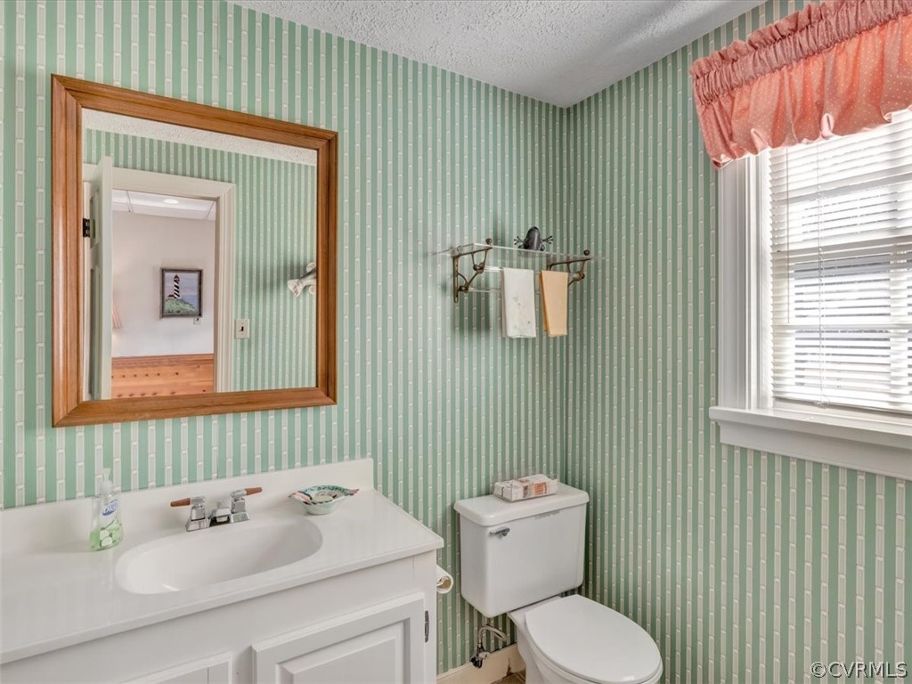 209 Ralston Road Henrico, VA 23229 - Photo 28 of 32 a bathroom with a sink toilet and mirror