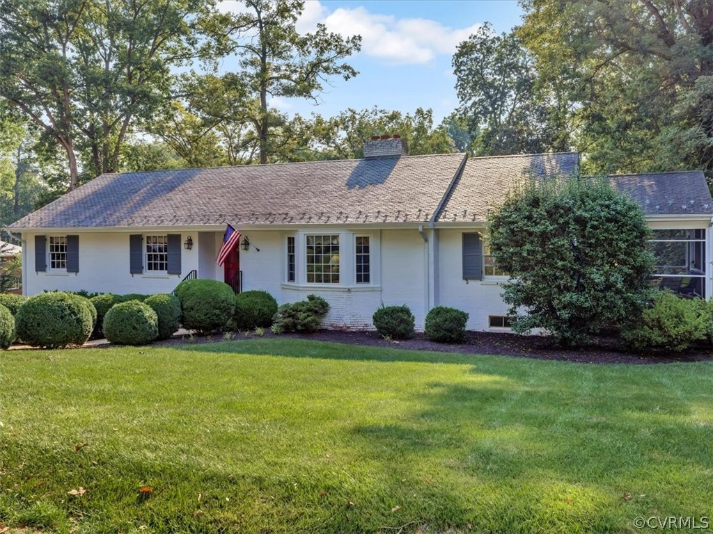 209 Ralston Road Henrico, VA 23229 - Photo 3 of 32 a front view of a house with a garden