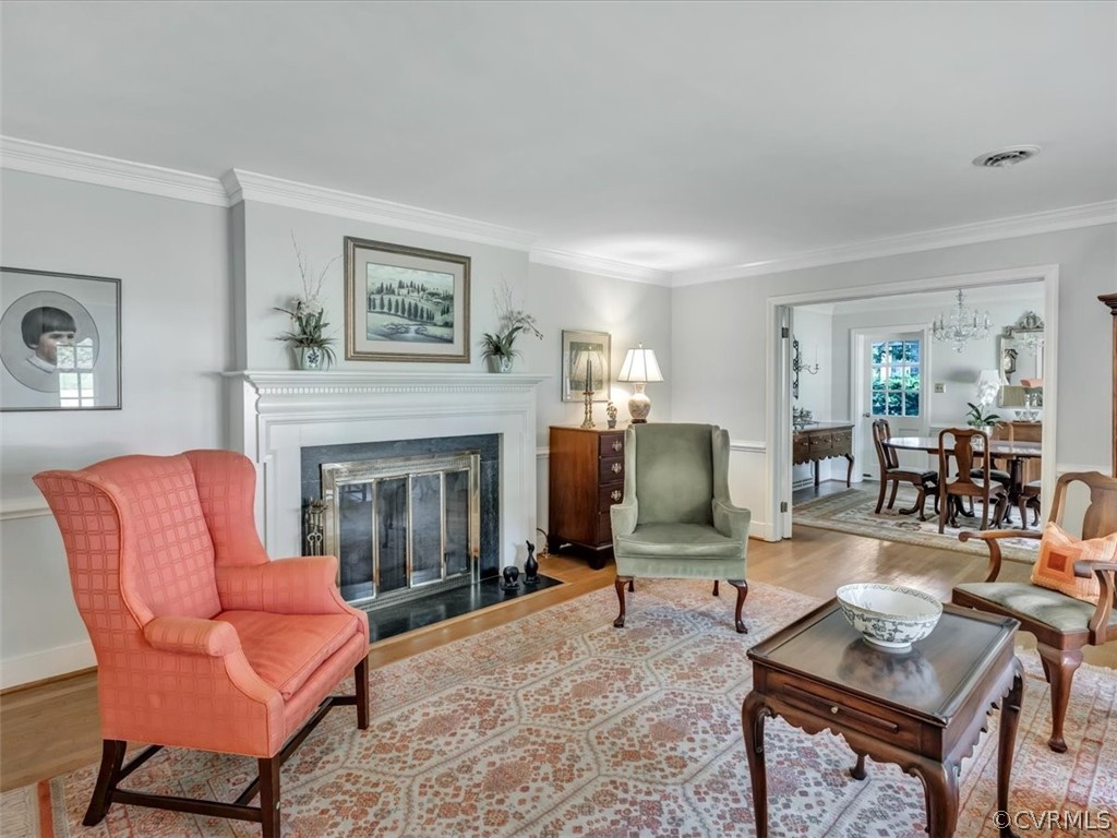 209 Ralston Road Henrico, VA 23229 - Photo 5 of 32 a living room with furniture and a fireplace