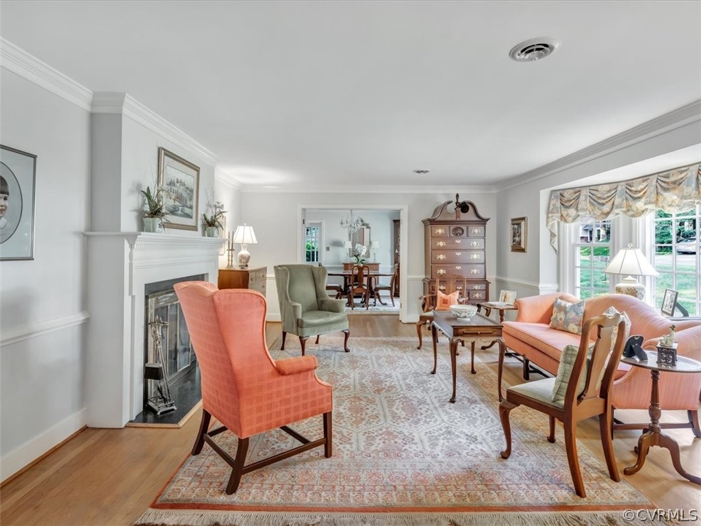 209 Ralston Road Henrico, VA 23229 - Photo 7 of 32 a living room with furniture and a floor to ceiling window