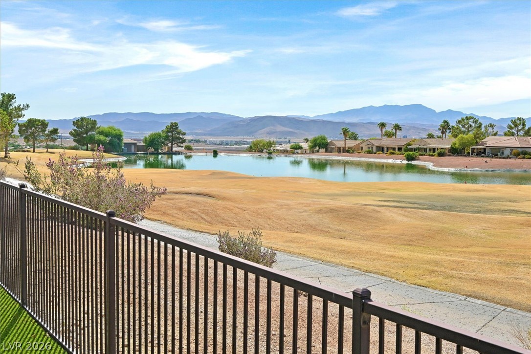 1823 Baton Rouge Street Henderson, NV 89052 - Photo 29 of 60 Gaze across the tranquil water feature & majestic mountains beyond.
Overlooking the golf course (in repair)