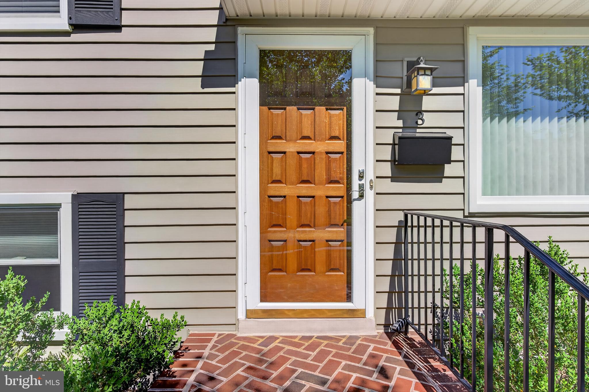 3 North Hilltop Road Baltimore, MD 21228 - Photo 34 of 34 Attractive solid walnut door. Come walk inside!