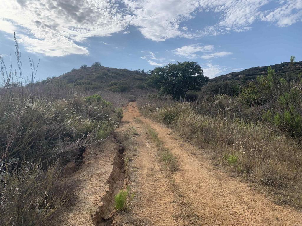 17484 Rockwood Road Escondido, CA 92027 - Photo 3 of 9 a view of a pathway both side of river