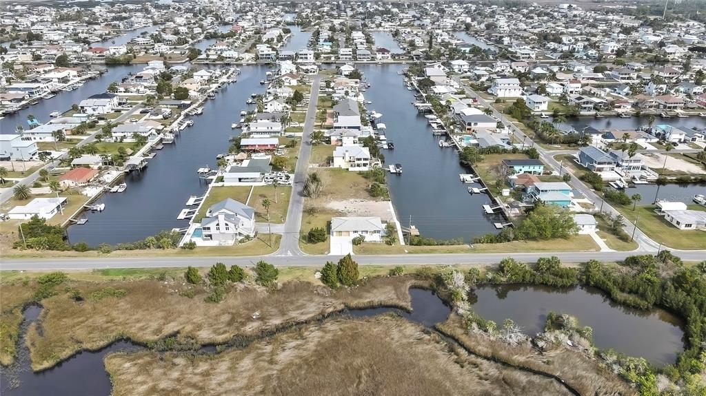 3449 Companero Entra Hernando Beach, FL 34607 - Photo 3 of 31 an aerial view of residential houses with outdoor space