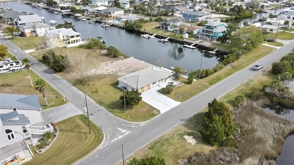 3449 Companero Entra Hernando Beach, FL 34607 - Photo 5 of 31 an aerial view of residential houses with outdoor space