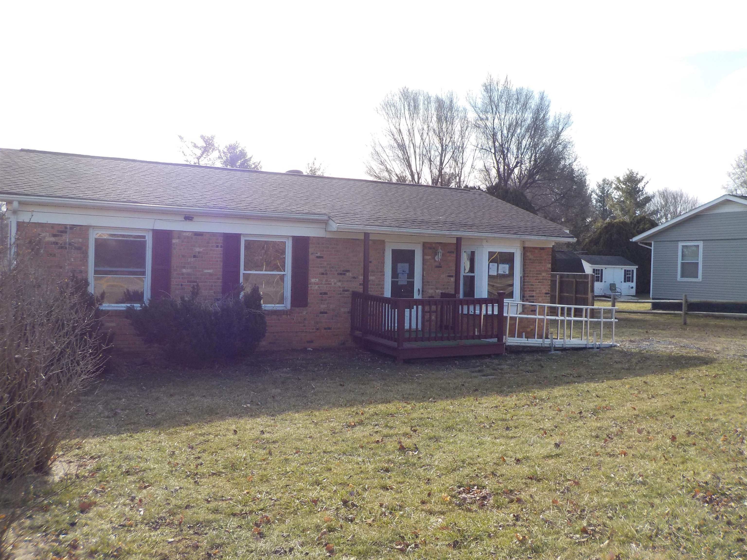 852 Augusta Farms Road Waynesboro, VA 22980 - Photo 1 of 22 a view of a yard in front of a house with large trees