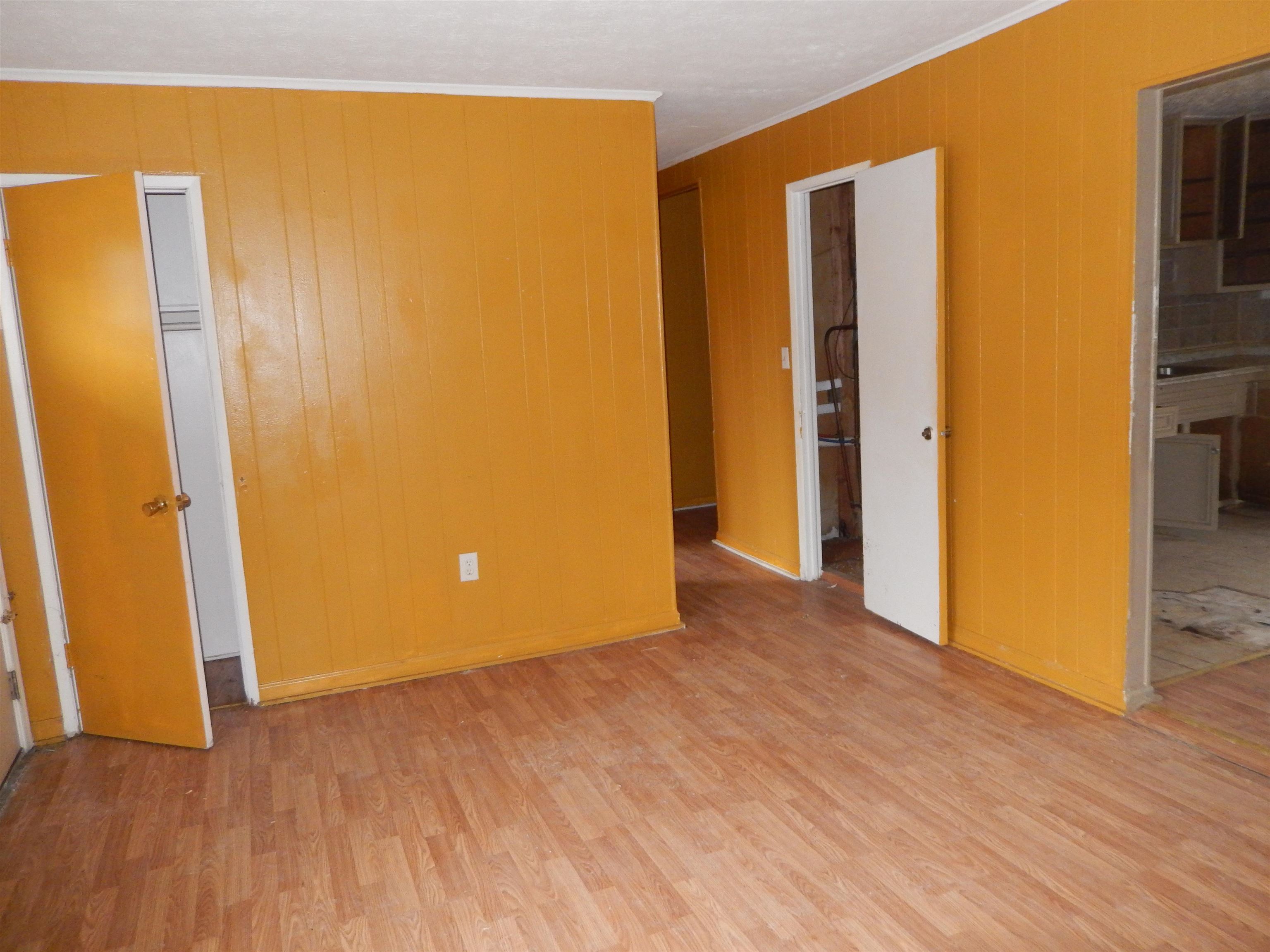 852 Augusta Farms Road Waynesboro, VA 22980 - Photo 10 of 22 a view of an empty room with wooden floor and a window