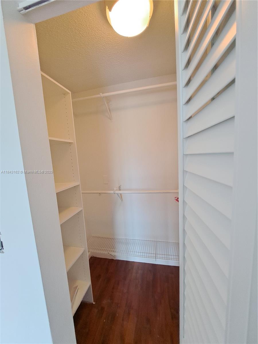 100 Ocean Ln Drive, Unit 403 Key Biscayne, FL 33149 - Photo 22 of 27 a view of walk in closet