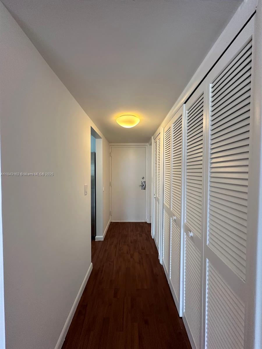 100 Ocean Ln Drive, Unit 403 Key Biscayne, FL 33149 - Photo 8 of 27 a view of hallway with a hallway