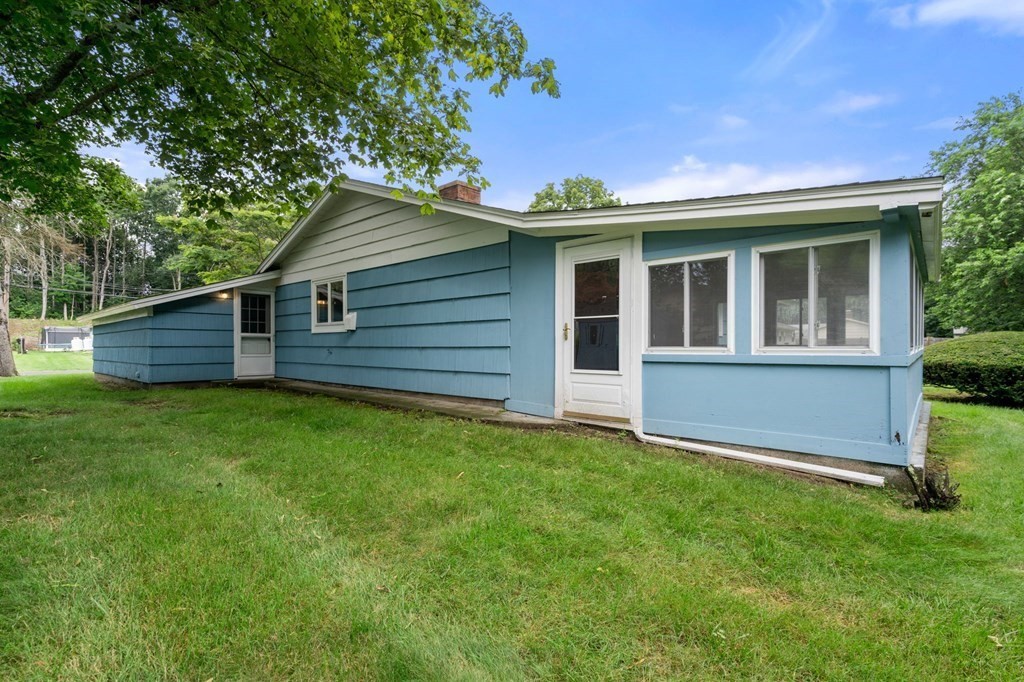 23 Edith Road Framingham, MA 01701 - Photo 21 of 22 a view of a house with a backyard