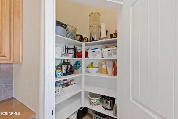 a bed room with a bed and a television