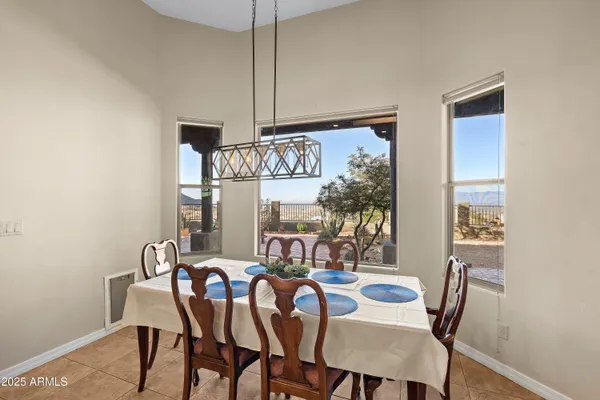a bathroom with a sink a large mirror and a bathtub with shower