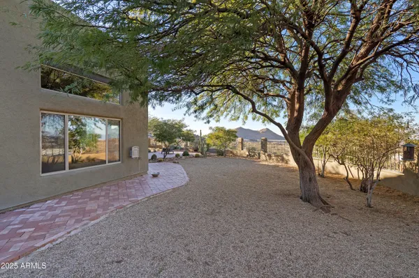 a view of a city with mountains in the background