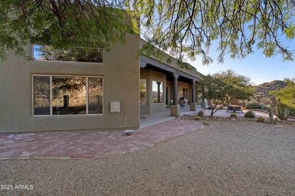 a view of a town with mountains in the background