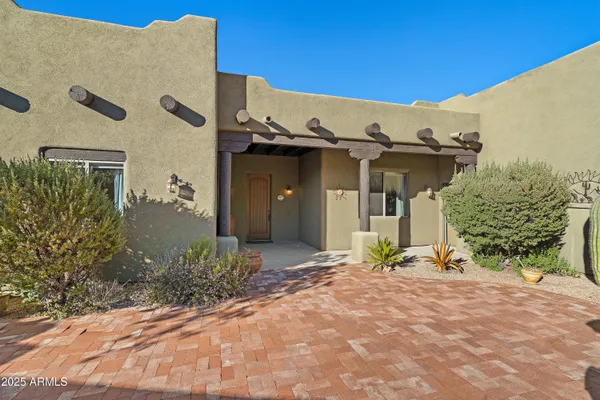 a living room with furniture a dining table and a stove