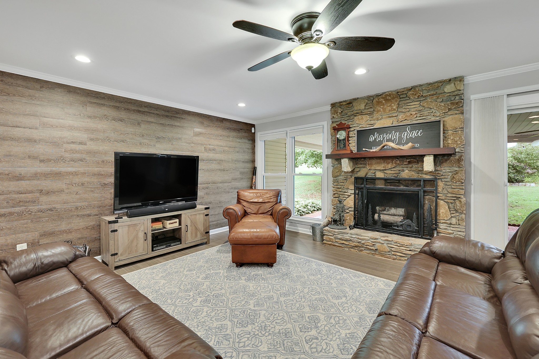 1106 Rip Steele Road Columbia, TN 38401 - Photo 17 of 70 a living room with furniture and a fireplace or television
