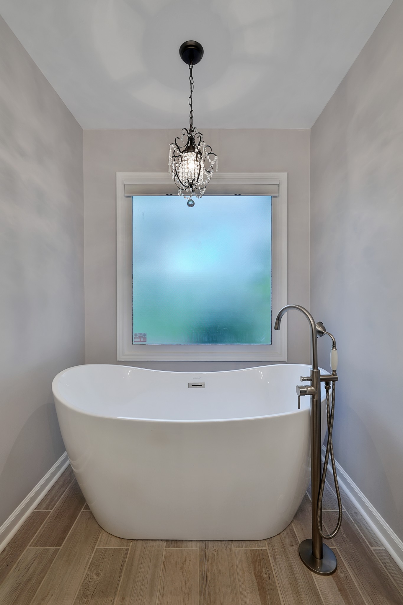1106 Rip Steele Road Columbia, TN 38401 - Photo 23 of 70 a white bath tub sitting in a bathroom