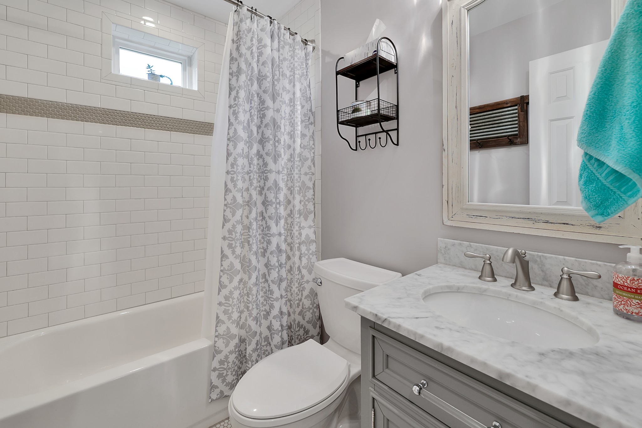 1106 Rip Steele Road Columbia, TN 38401 - Photo 27 of 70 a bathroom with a granite countertop sink toilet and shower