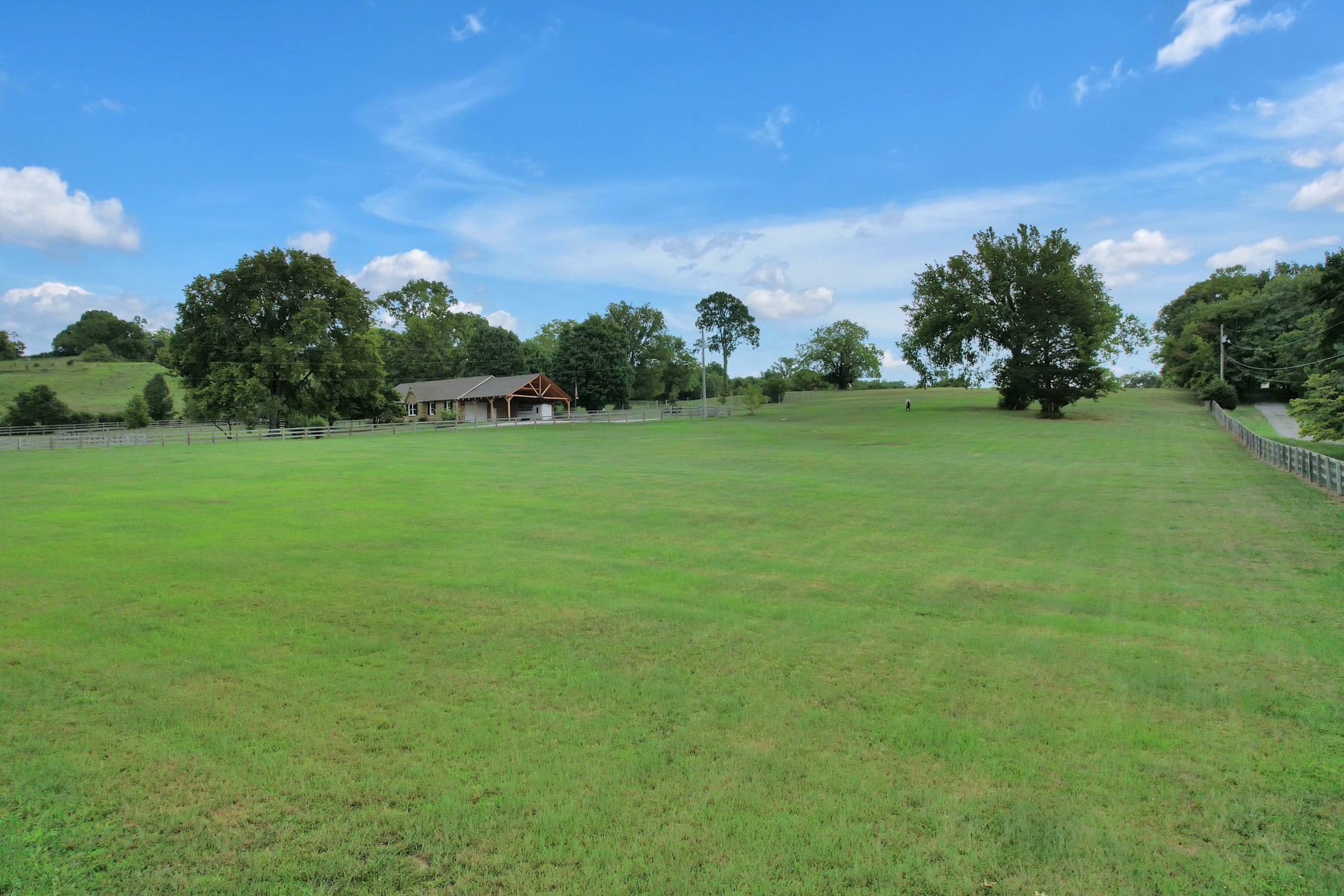 1106 Rip Steele Road Columbia, TN 38401 - Photo 35 of 70 a view of a field of grass and trees