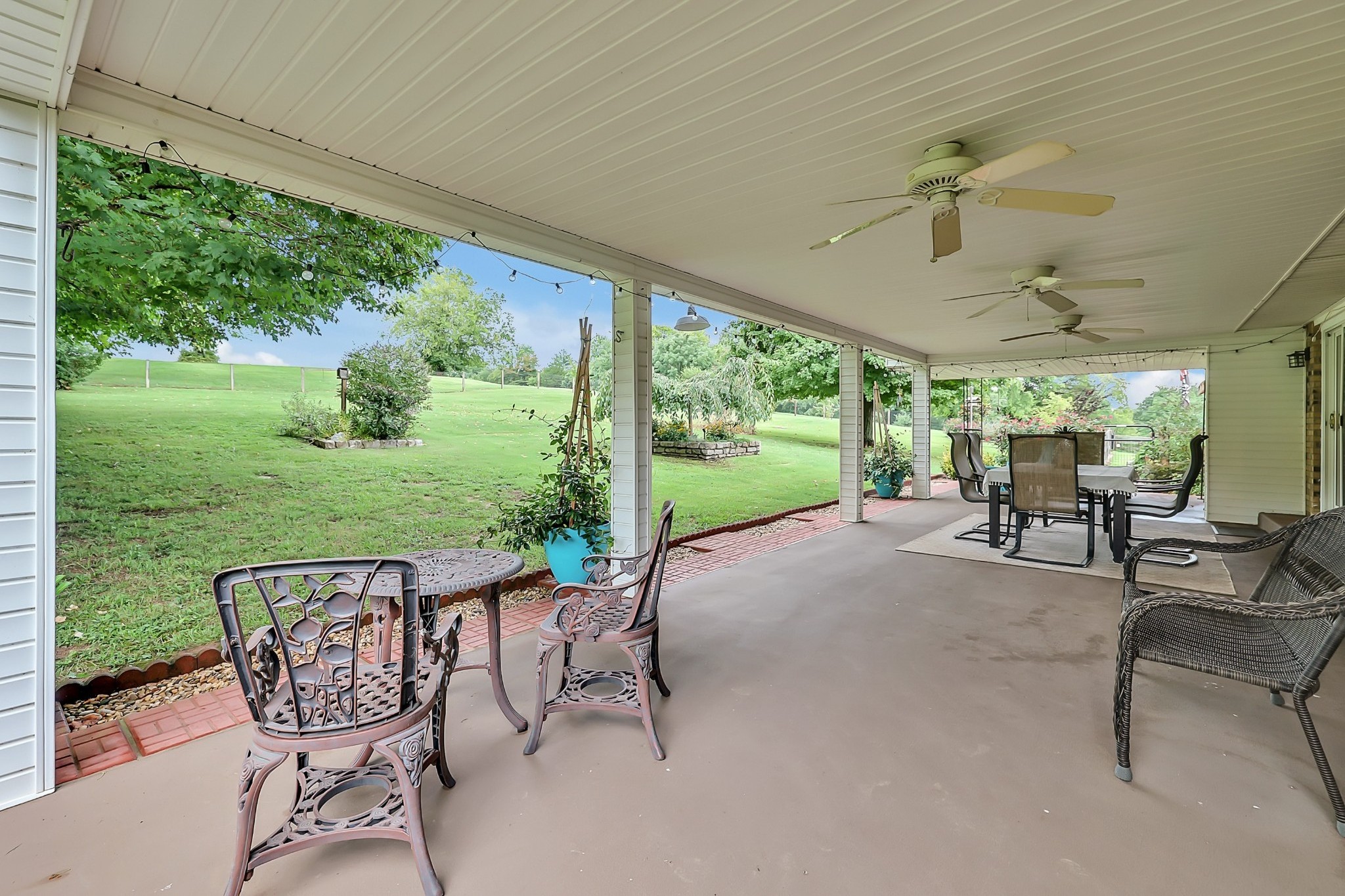 1106 Rip Steele Road Columbia, TN 38401 - Photo 39 of 70 a view of a patio with a table chairs and backyard