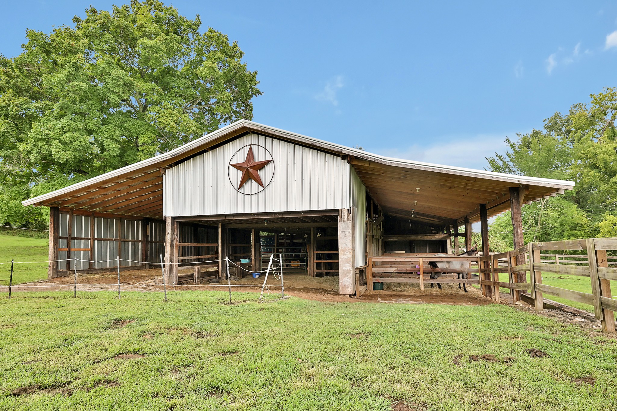 1106 Rip Steele Road Columbia, TN 38401 - Photo 53 of 70 a view of a house with backyard porch and sitting area