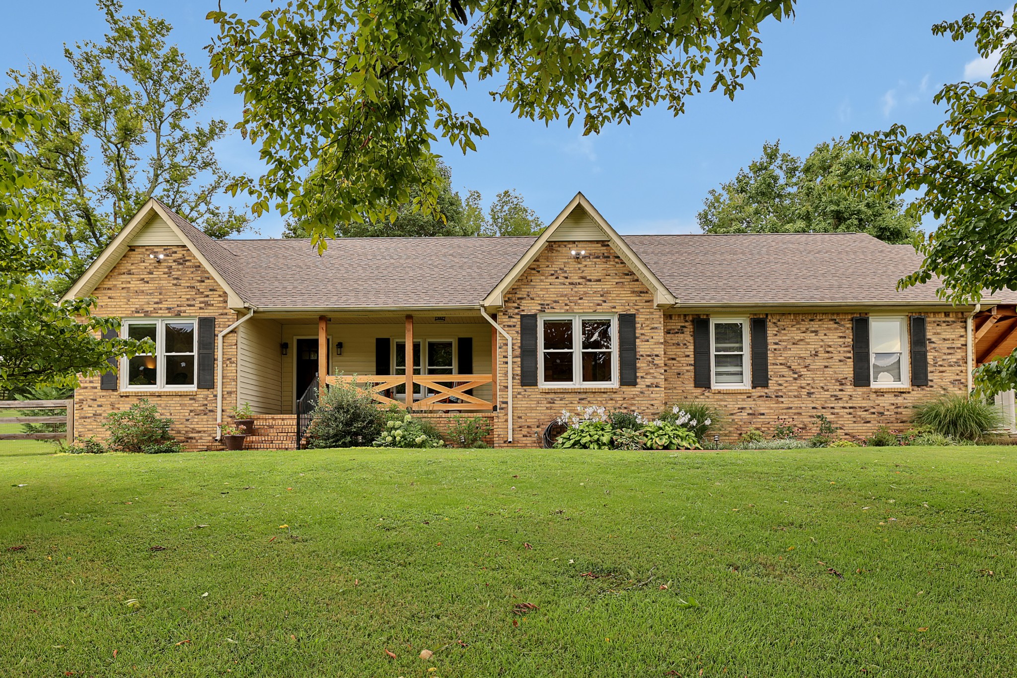 1106 Rip Steele Road Columbia, TN 38401 - Photo 70 of 70 a front view of a house with a yard and trees