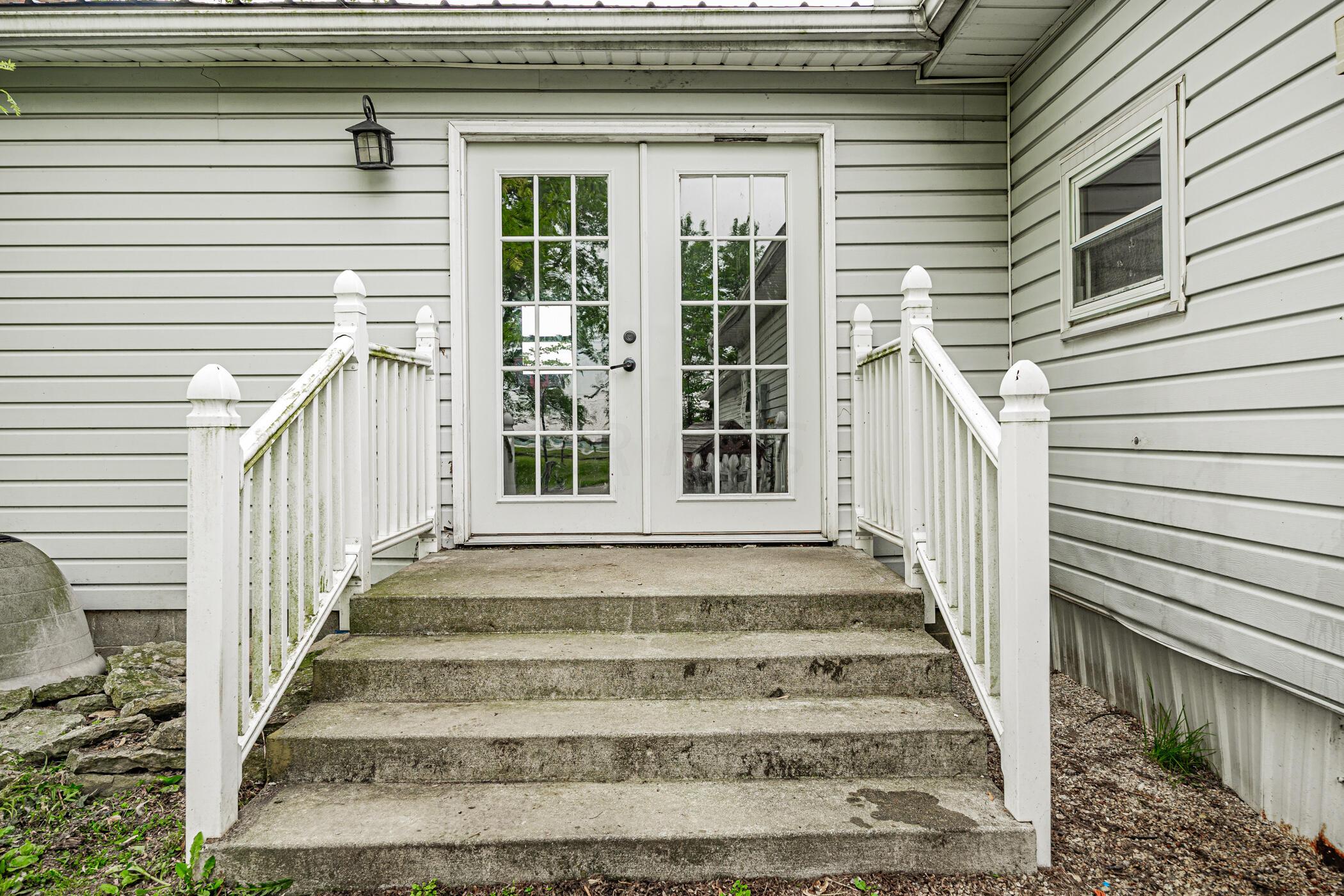 12913 Fladt Road Marysville, OH 43040 - Photo 41 of 73 French doors from family room leading to backyard