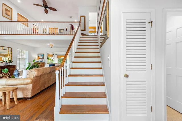 a kitchen with stainless steel appliances granite countertop a refrigerator stove and sink