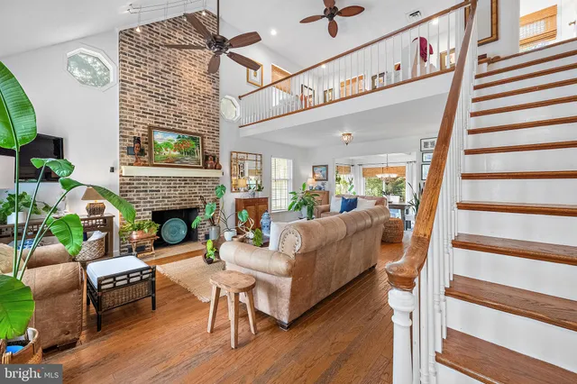 a kitchen with stainless steel appliances a stove a sink and a microwave