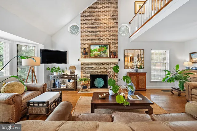 a view of a dining room with furniture and window