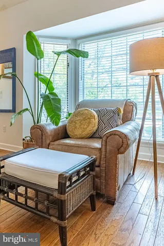 a bathroom with a granite countertop sink a vanity and a mirror