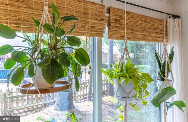 a view of swimming pool with sitting area and furniture