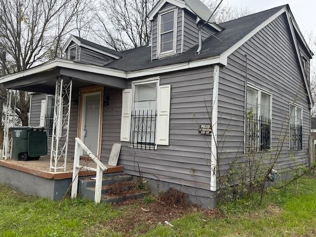 a front view of a house with a porch