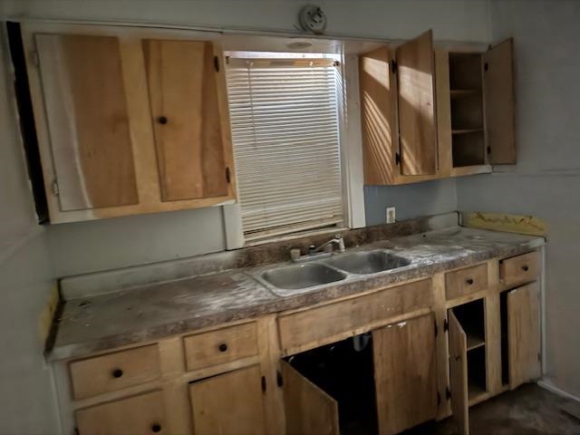 2984 Benjestown Road Memphis, TN 38127 - Photo 4 of 7 a kitchen with granite countertop a sink and a stove
