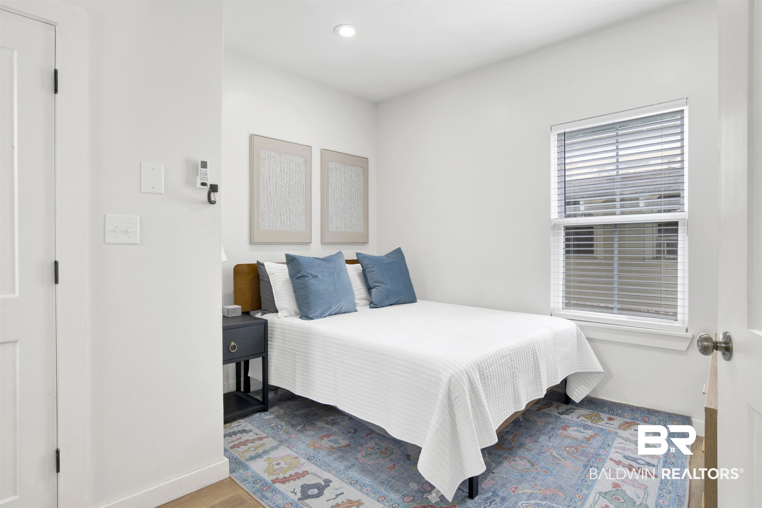 555 Congress Street Mobile, AL 36603 - Photo 13 of 27 Bedroom with wood finished floors and recessed lighting
