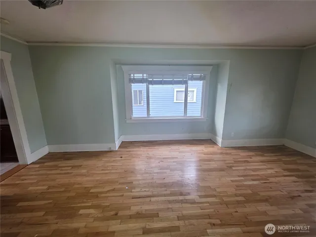 a view of an empty room and window