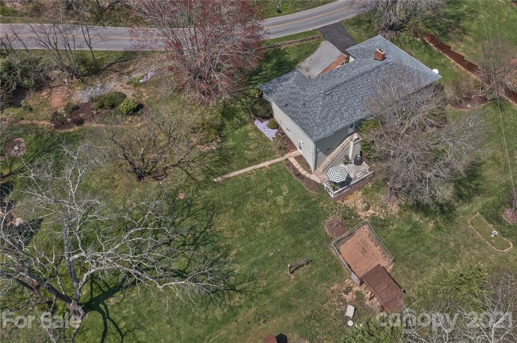 127 Queentown Road Canton, NC 28716 - Photo 37 of 43 an aerial view of a house with a yard