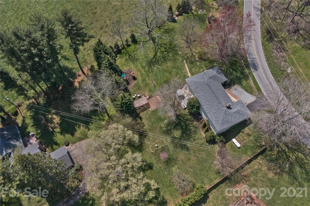 127 Queentown Road Canton, NC 28716 - Photo 38 of 43 an aerial view of house with yard and mountain view in back