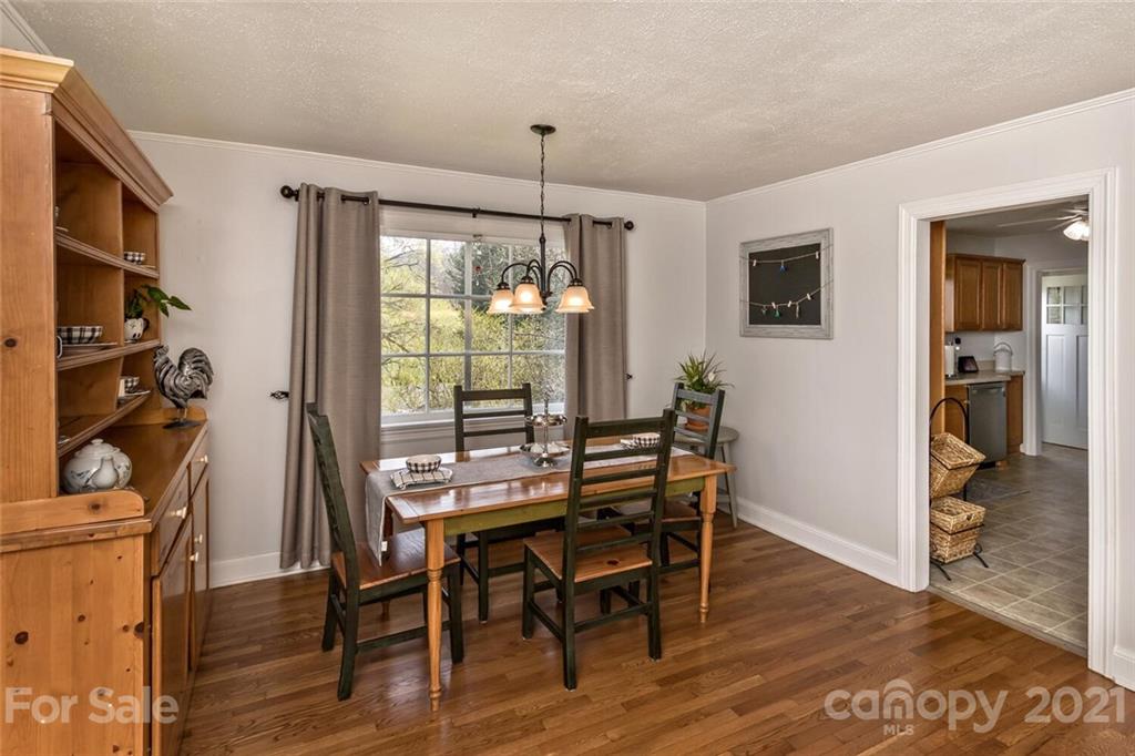 127 Queentown Road Canton, NC 28716 - Photo 10 of 43 a dining room with furniture and window
