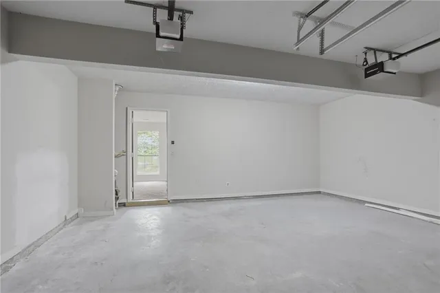 front view of a brick house with a large window