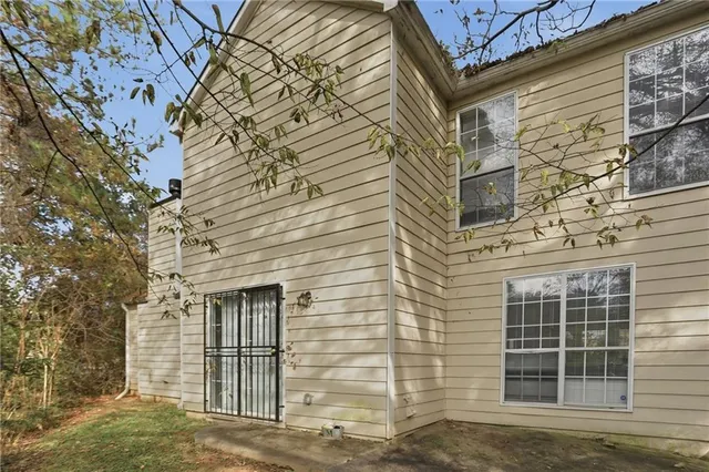 a front view of a house with a garage