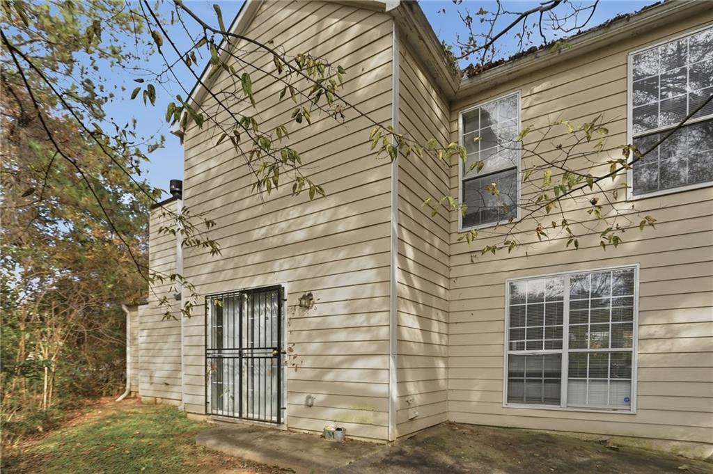 2191 Phillips Road Lithonia, GA 30058 - Photo 33 of 41 front view of a brick house with a large window