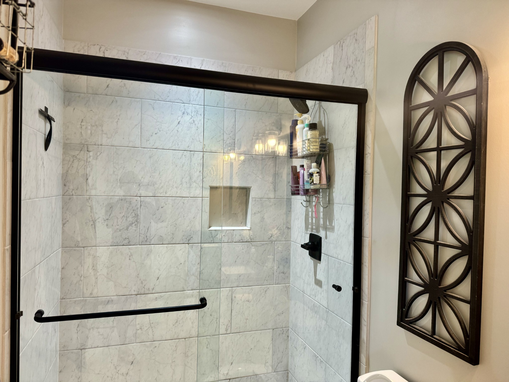 172 Tenpenny Road Morrison, TN 37357 - Photo 13 of 27 a bathroom with a glass shower door and a window