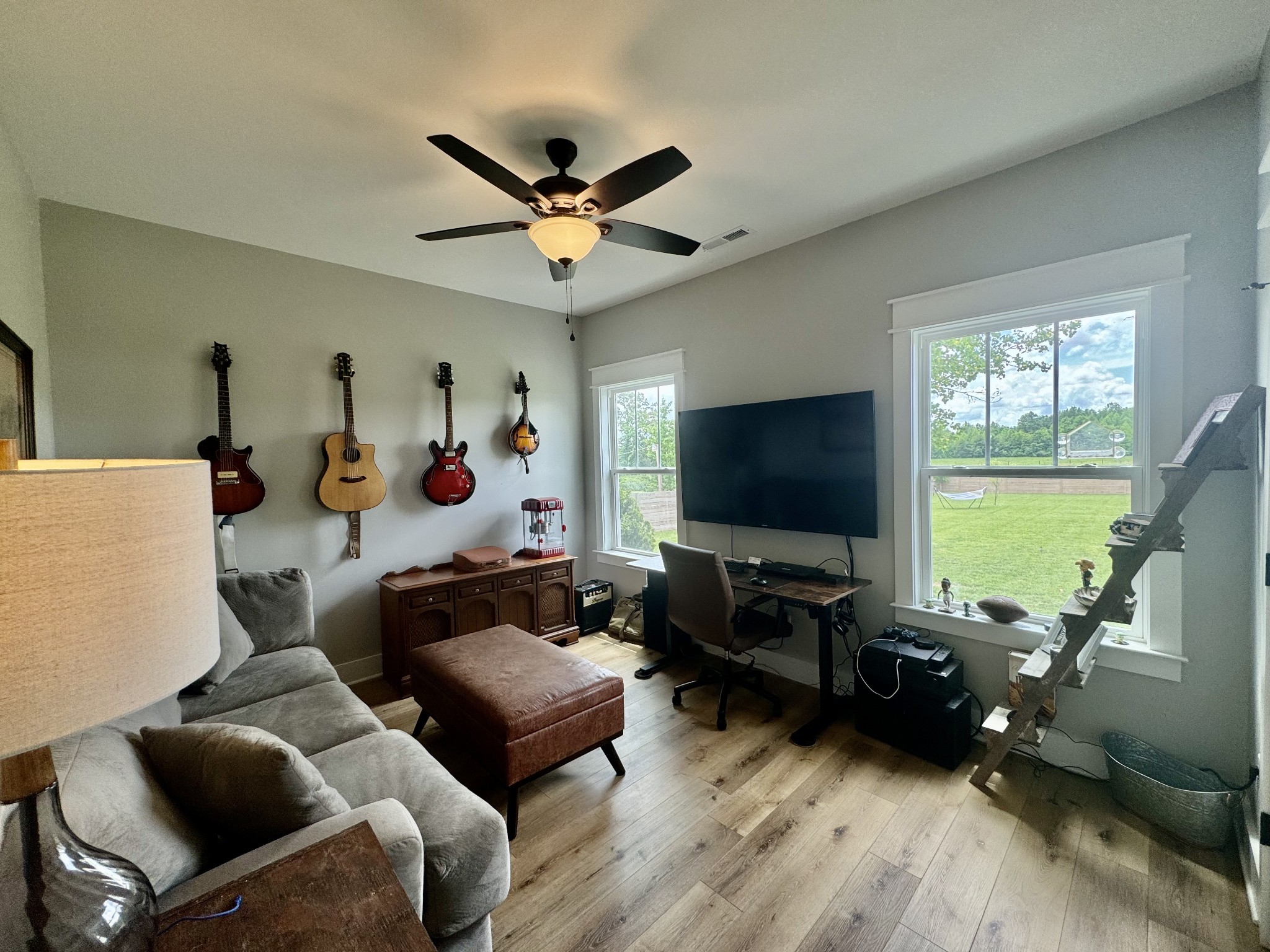 172 Tenpenny Road Morrison, TN 37357 - Photo 15 of 27 a living room with furniture and a flat screen tv